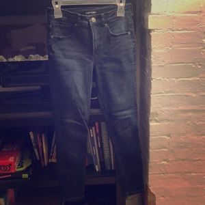 Express dark wash high waisted jean leggings.